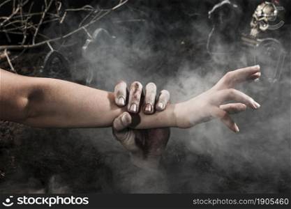 zombie hand catching person halloween cemetery. Beautiful photo. zombie hand catching person halloween cemetery