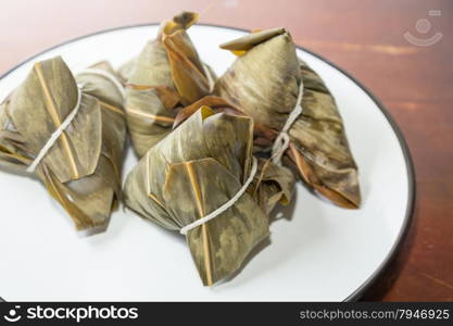 Zongzi in a plate. Zhongzi is a traditional Chinese food eaten during Dragon boat Festival