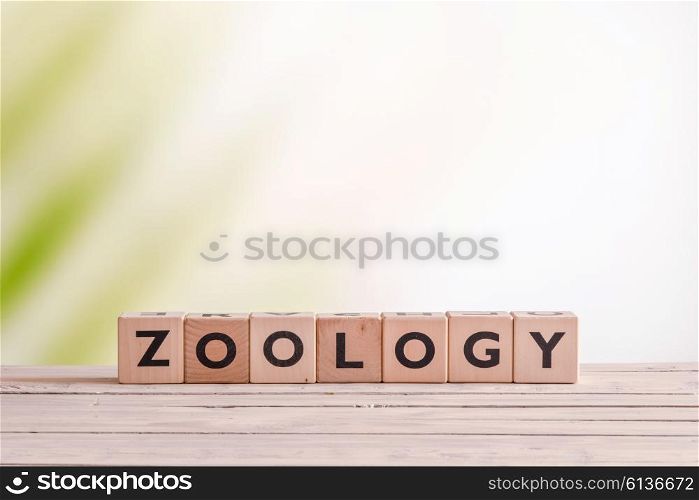 Zoology lesson sign on a table in the wild