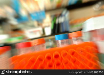 Zoomed lab detail of colorful test tubes.