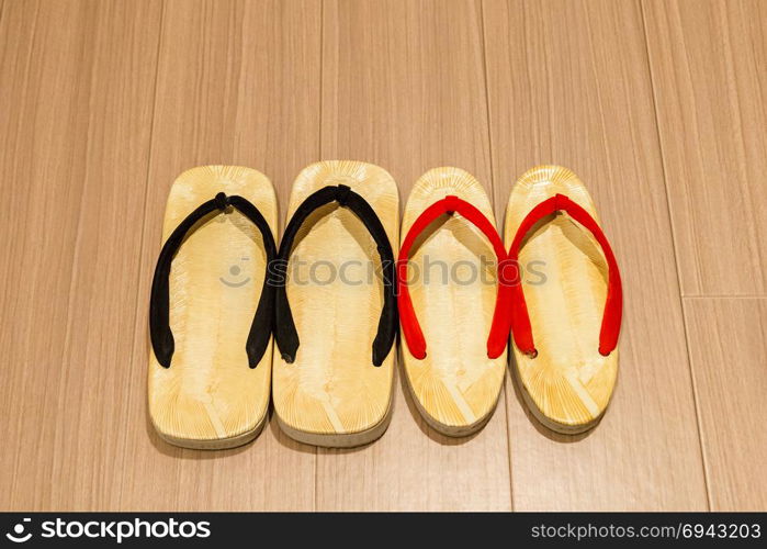 Zori sandal on wooden floor.