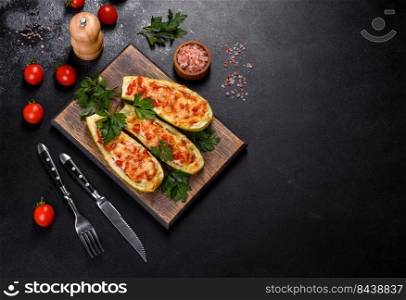 Zucχni stuffed with meat, ve≥tab≤s and cheese. Zucχni boats. Loaded zucχni. Baked stuffed zucχni boats with mincedχckenμshrooms and ve≥tab≤s with cheese