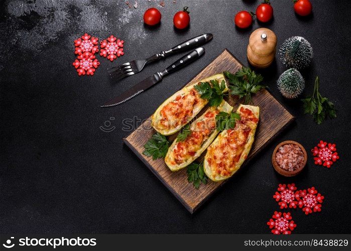 Zucchini stuffed with meat, vegetables and cheese. Zucchini boats. Loaded zucchini. Baked stuffed zucchini boats with minced chicken mushrooms and vegetables with cheese. Christmas table