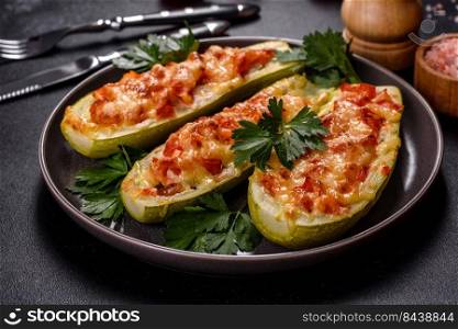 Zucchini stuffed with meat, vegetables and cheese. Zucchini boats. Loaded zucchini. Baked stuffed zucchini boats with minced chicken mushrooms and vegetables with cheese