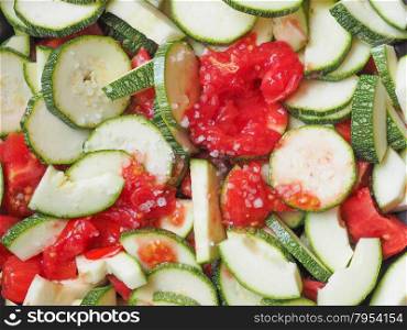 Zucchini with tomato. Courgettes vegetables with tomato sauce useful as a background
