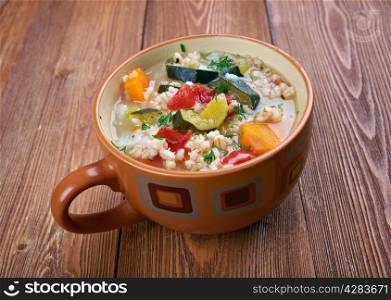 Zuppa d?orzo - barley soup with vegetables, traditional italian dish