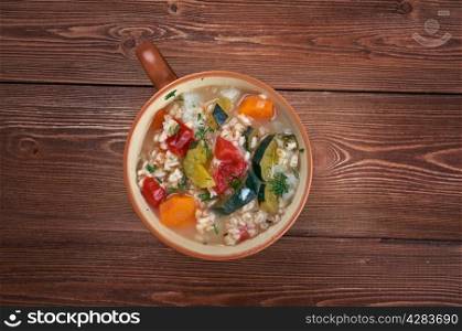 Zuppa d?orzo - barley soup with vegetables, traditional italian dish
