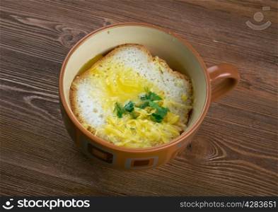 Zuppa pavese - Pavia soup, Italian soup consisting of broth into which fried slices of bread and poached eggs