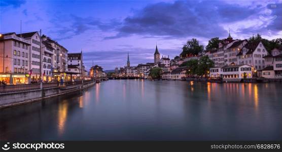 ZURICH, SWITZELAND - 04 June, 2016: Zurich Skyline and Limmat River. The river commences at the outfall of Lake Zurich, in the centre of the city of Zurich.