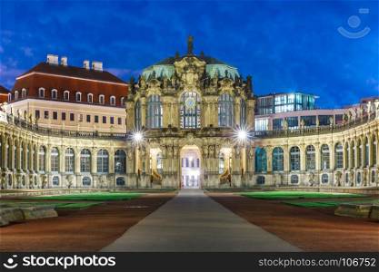 Zwinger at night in Dresden, Germany. Palace in Rococo style and Zwinger at night in Dresden, Saxony, eastern Germany